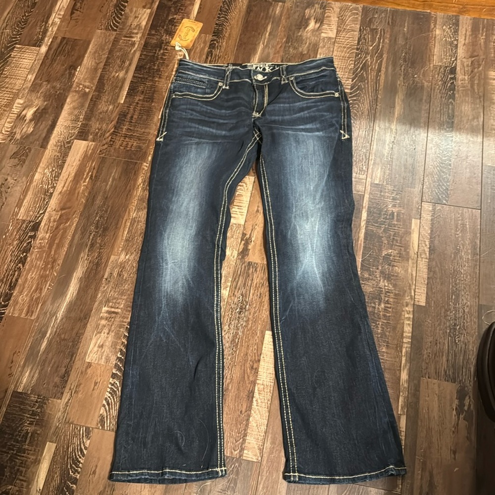 Buckle Black Boot cut jeans.  New with tags on.